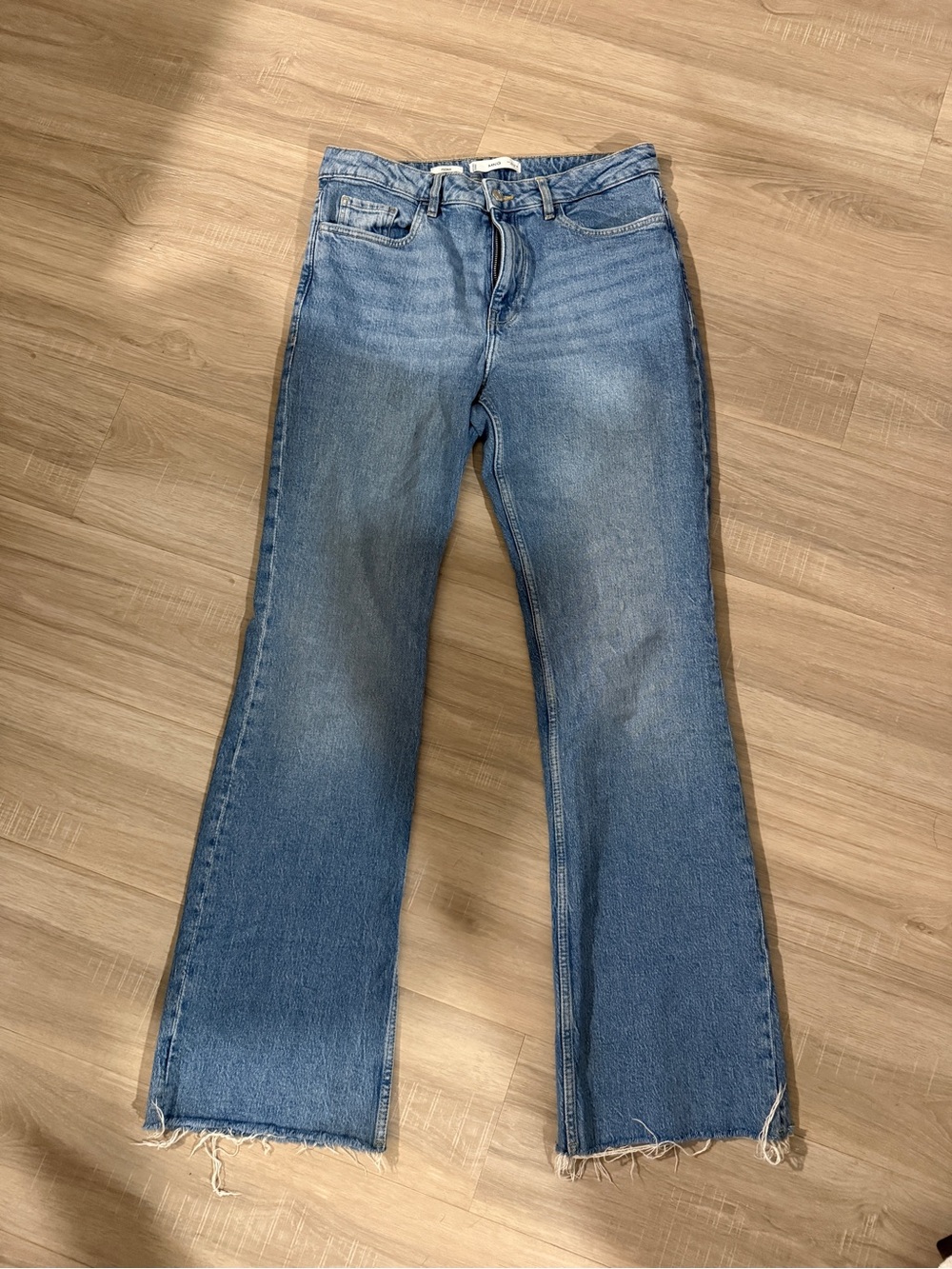 Mango Light Blue Flared Jeans with Raw Hem